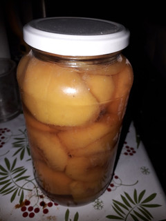 Una foto de Duraznos en almíbar