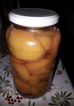 Una foto de Duraznos en almíbar