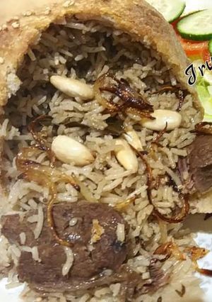 A picture of 🍝🥘Arabian Ouzi Rice or (Parda Pulo)🥘🍝.