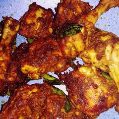 A picture of Chicken roasted in milk.