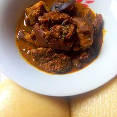 A picture of Ogbono soup with eba.