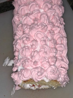 A picture of Swiss roll with cream #baking contest.