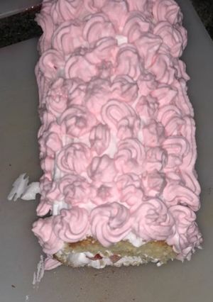 A picture of Swiss roll with cream #baking contest.
