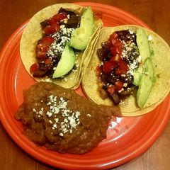 A picture of Wagyu Beef Cheeks Tacos.