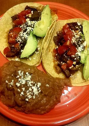 A picture of Wagyu Beef Cheeks Tacos.
