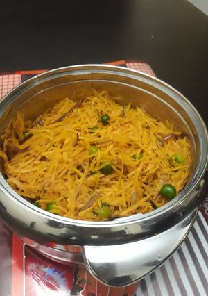 A picture of Dry abacha with ugba and garden egg.