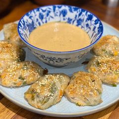 A picture of Ebi Nira Harumaki - prawn and garlic chive rice paper packets.
