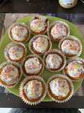 Strawberry cupcakes with vanilla frosting and sprinkles