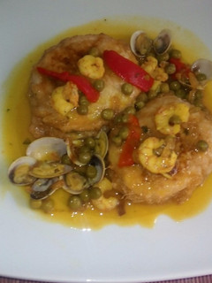 Una foto de Pescado En Salsa