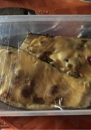 Una foto de Berenjena rellena con lechón y verduras