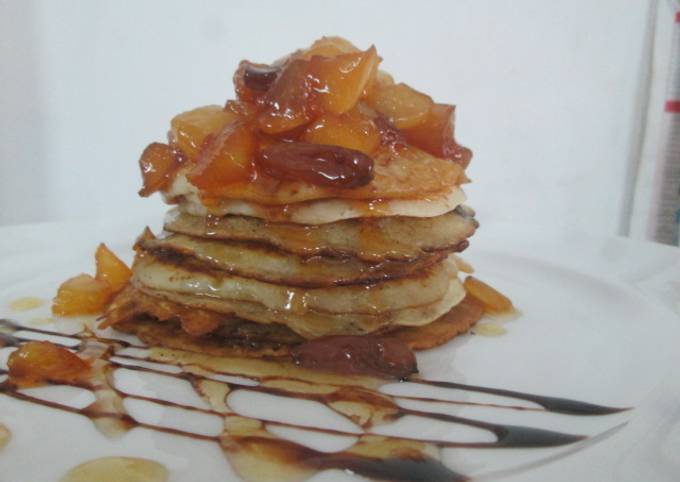 Wheat flour pancake with caramelized fruits and honey glaze