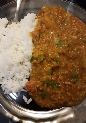 A picture of Masoor Dahl (Red Lentil Curry) with Rice.