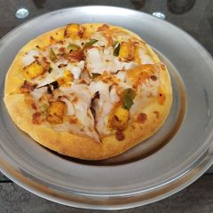Paneer Tikka Pizza A picture of Paneer Tikka Pizza.