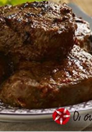 Φωτογραφία της συνταγής Χοιρινές μπριζόλες σε μαρινάδα λιαστής τομάτας