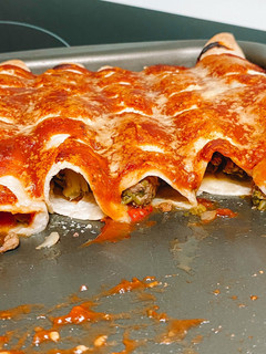 Una foto de Canelones rápidos con rapiditas rellenas de acelga y carne