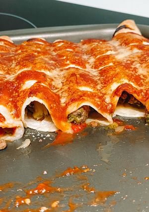 Una foto de Canelones rápidos con rapiditas rellenas de acelga y carne