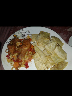 A picture of Fried Yam and chicken sauce.