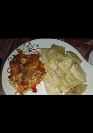 A picture of Fried Yam and chicken sauce.