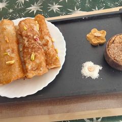 A picture of Patisapta pitha -A Bengali sweet.