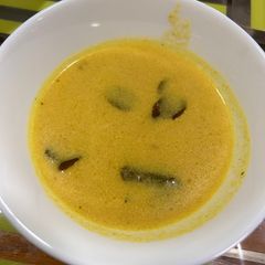 A picture of Kairichi saar / maharashtraian raw mango curry.