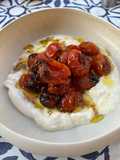 Aperitivo de burrata con tomates confitados
