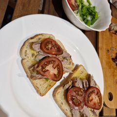 A picture of Duck and Green Onion Toasts.