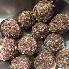 A picture of Haalim laddoos (Garden cress seed laddoos).