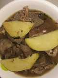 Goatmeat peppersoup with Irish potatoes