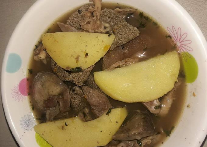 Goatmeat peppersoup with Irish potatoes