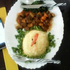 A picture of Rice and beef stew.