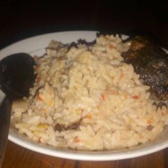 A picture of Coconut rice and fish.