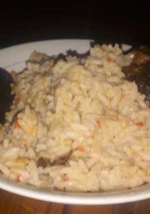 A picture of Coconut rice and fish.