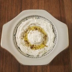 A picture of Labneh with za'atar seasoning.