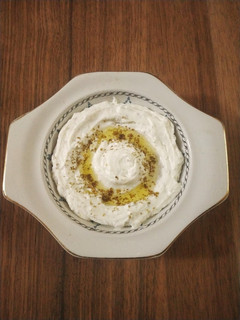 A picture of Labneh with za'atar seasoning.