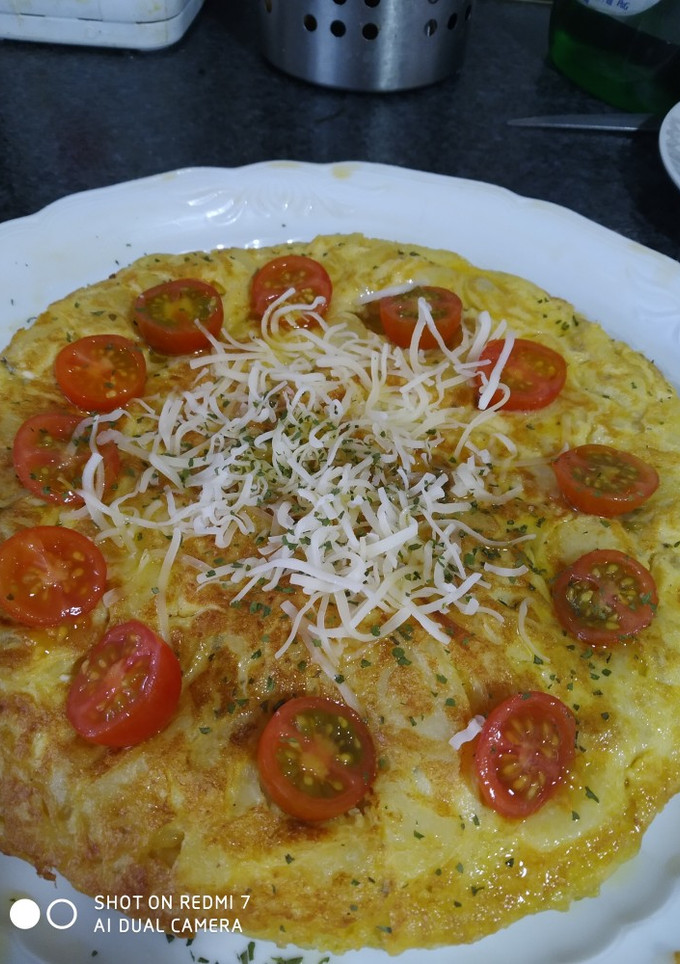 Una foto de Tortilla de patatas cremosa😋