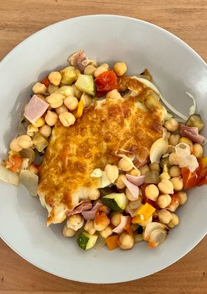 Una foto de 🫑 Garbanzos con verduras gratinados 🧀
