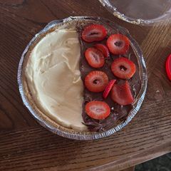 A picture of Half Chocolate & Strawberry Cheesecake.
