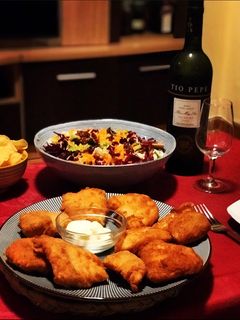 Una foto de Escalopines de mero con alioli