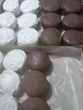 Alfajores de dulce de leche bañados en chocolate o merengue
