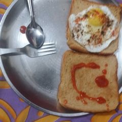A picture of Half fry with bread.