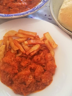 Una foto de Magro de cerdo con tomate en Mambo