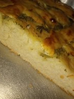 Una foto de Pan de ajo y queso