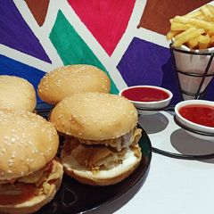 A picture of Homemade Zinger Burger 🍔🍟🍟🍔.
