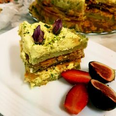 Pistachio cake with baklava and rabri frosting A picture of Pistachio cake with baklava and rabri frosting.