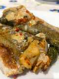 Ricciola con Pomodorini Freschi e Olive Verde al Forno