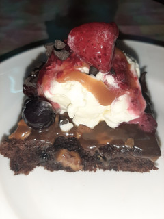 A picture of Brownies with caramel sauce 😋 Happy Father's Day.