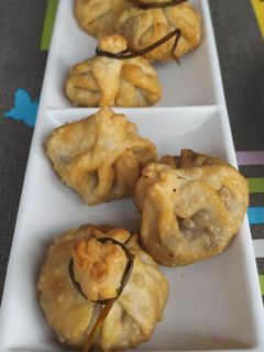 Una foto de Saquitos de morcilla con manzana