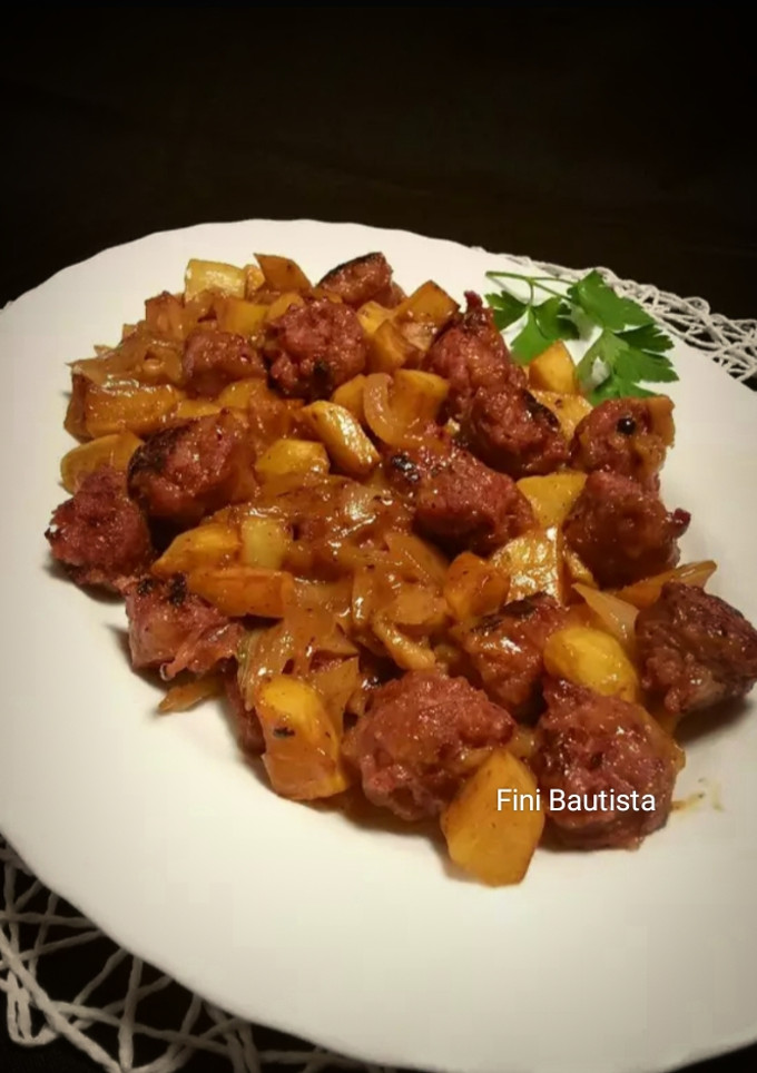 Una foto de Butifarra con patatas miel y mostaza