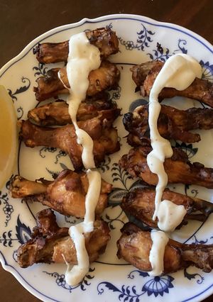 A picture of California Farm Crispy Chicken Wings in Blue Cheese Dip.