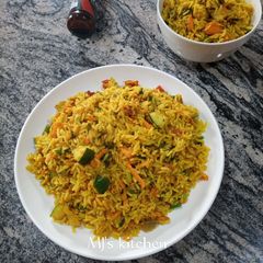 A picture of Orange flavored carrot rice.
